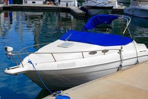 Speedboat covered next to the dock