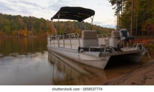 pontoon boat anchored
